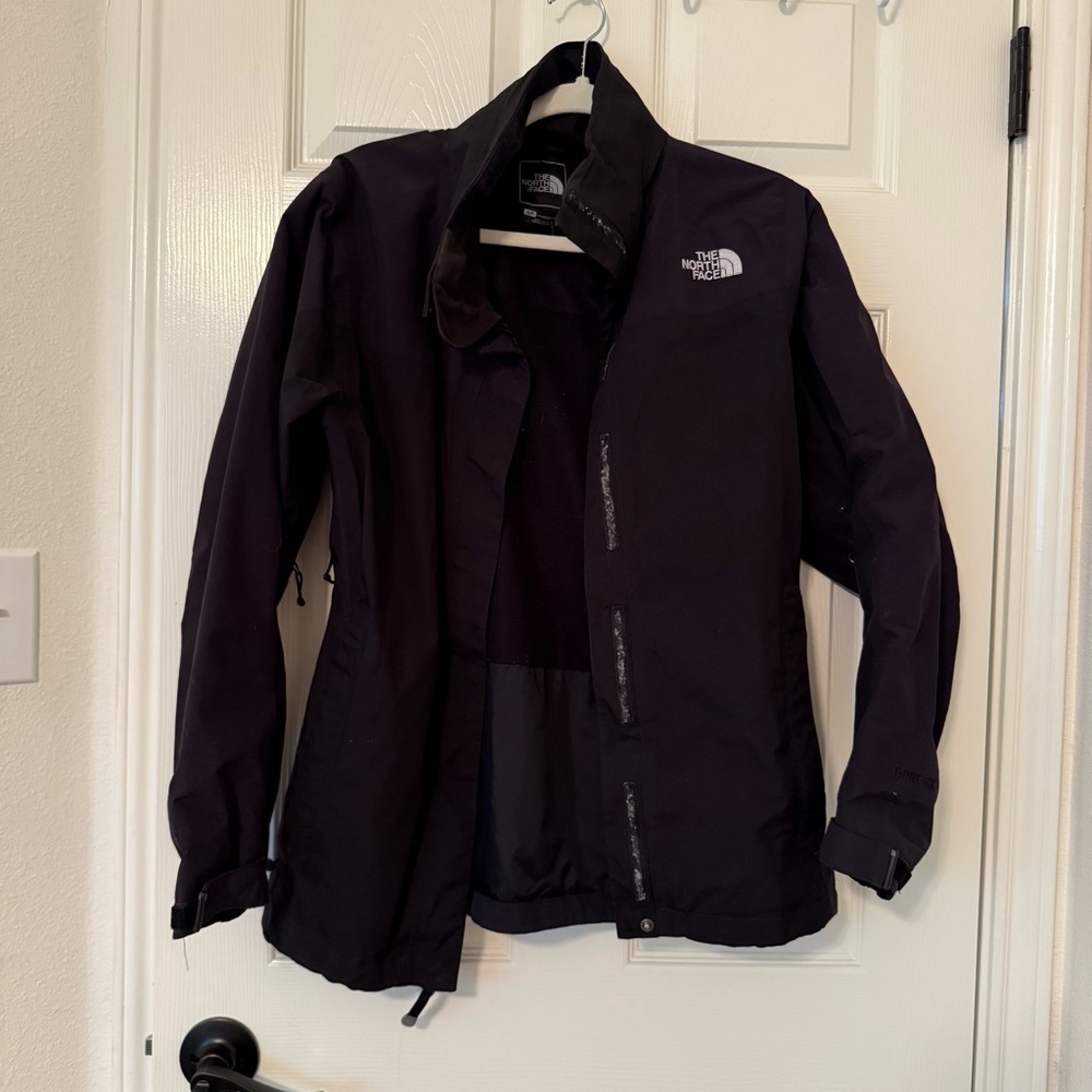 The North Face Women's Black gortex Jacket missing hoodie zipper pockets hiking